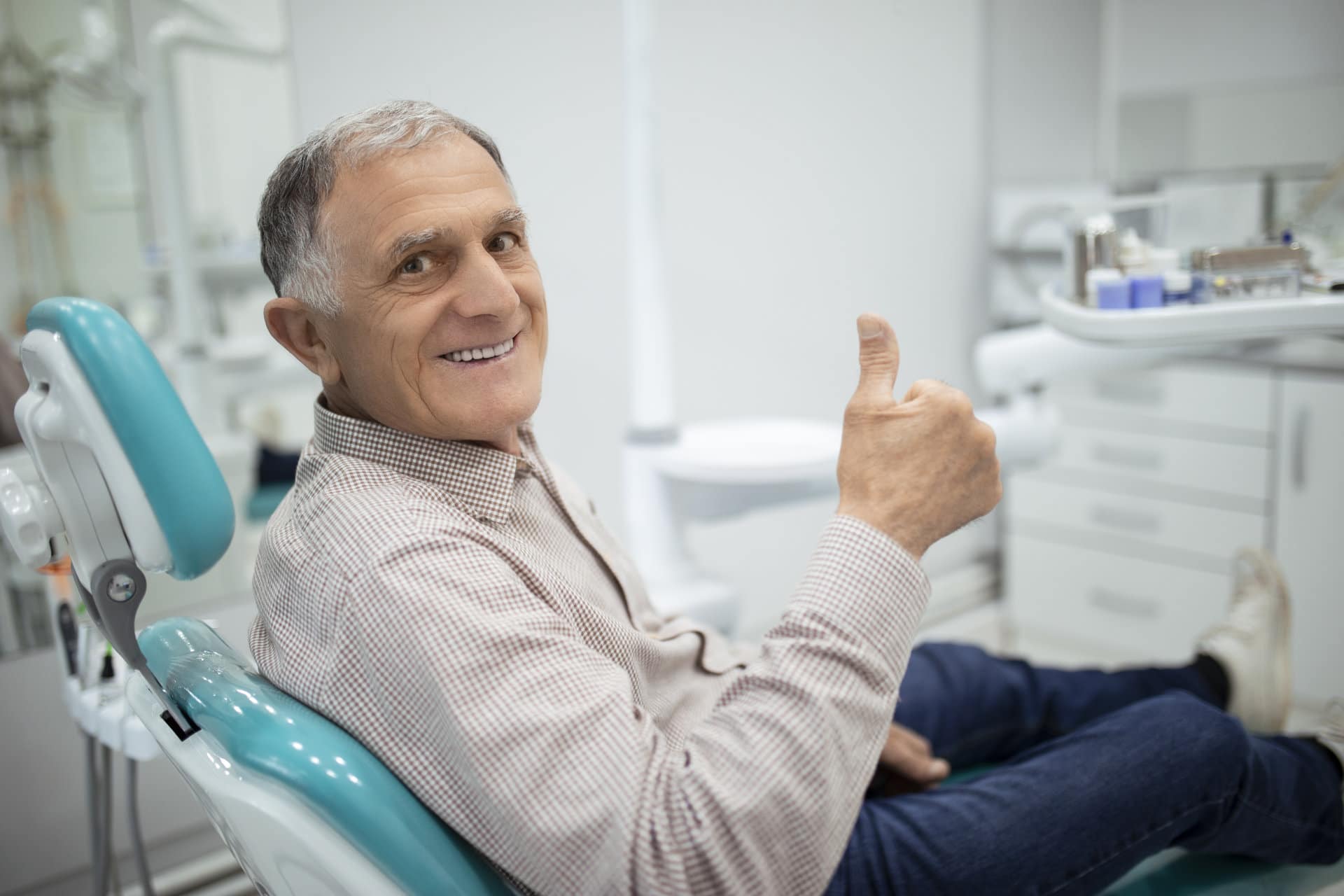 Dental implant patient at Dental Image in Crown Point, IN after reviewing his insurance benefits